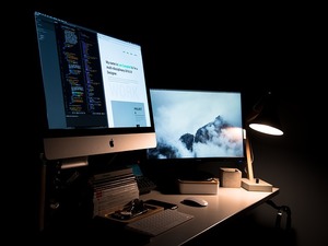 monitors in dark room
